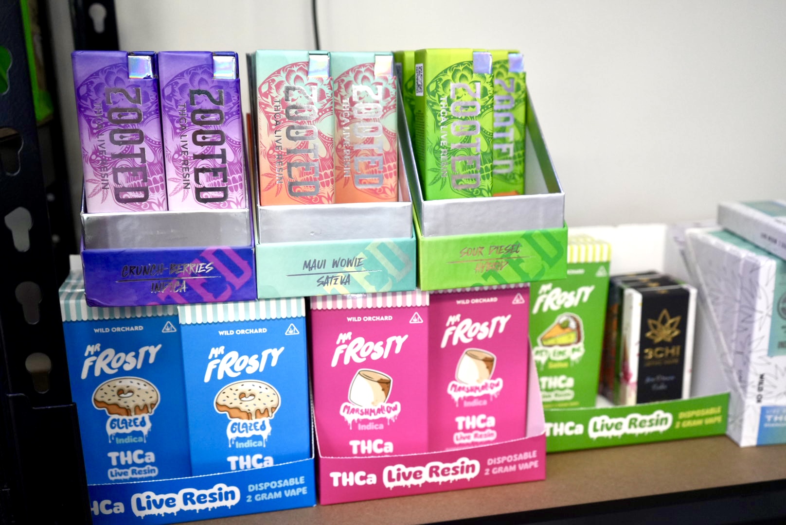 THC disposables and cartridges on display